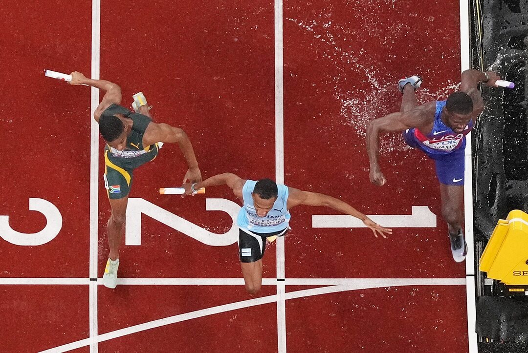 Busang Collen Kebinatshipi crosses the finish line ahead of South African and American sprinters to win the Men’s 4x400m relay final at Tokyo 2025, securing gold for Botswana.